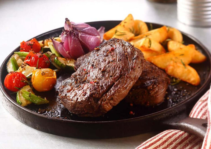 mock tenderloin steak shoulder clod on skillet